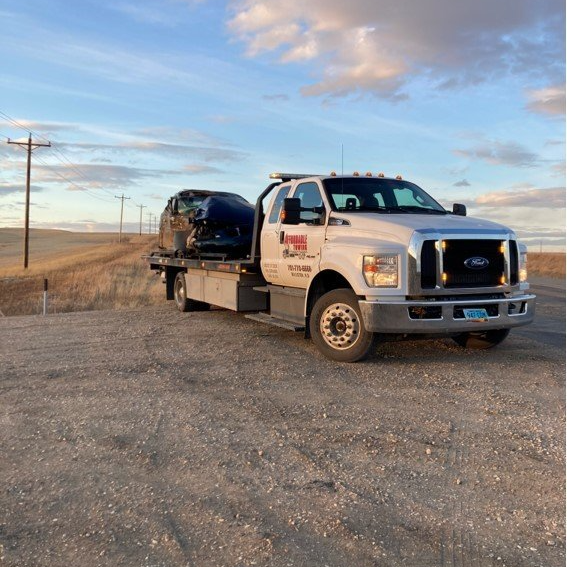 tire change on side of the road - towing service in Williston, ND