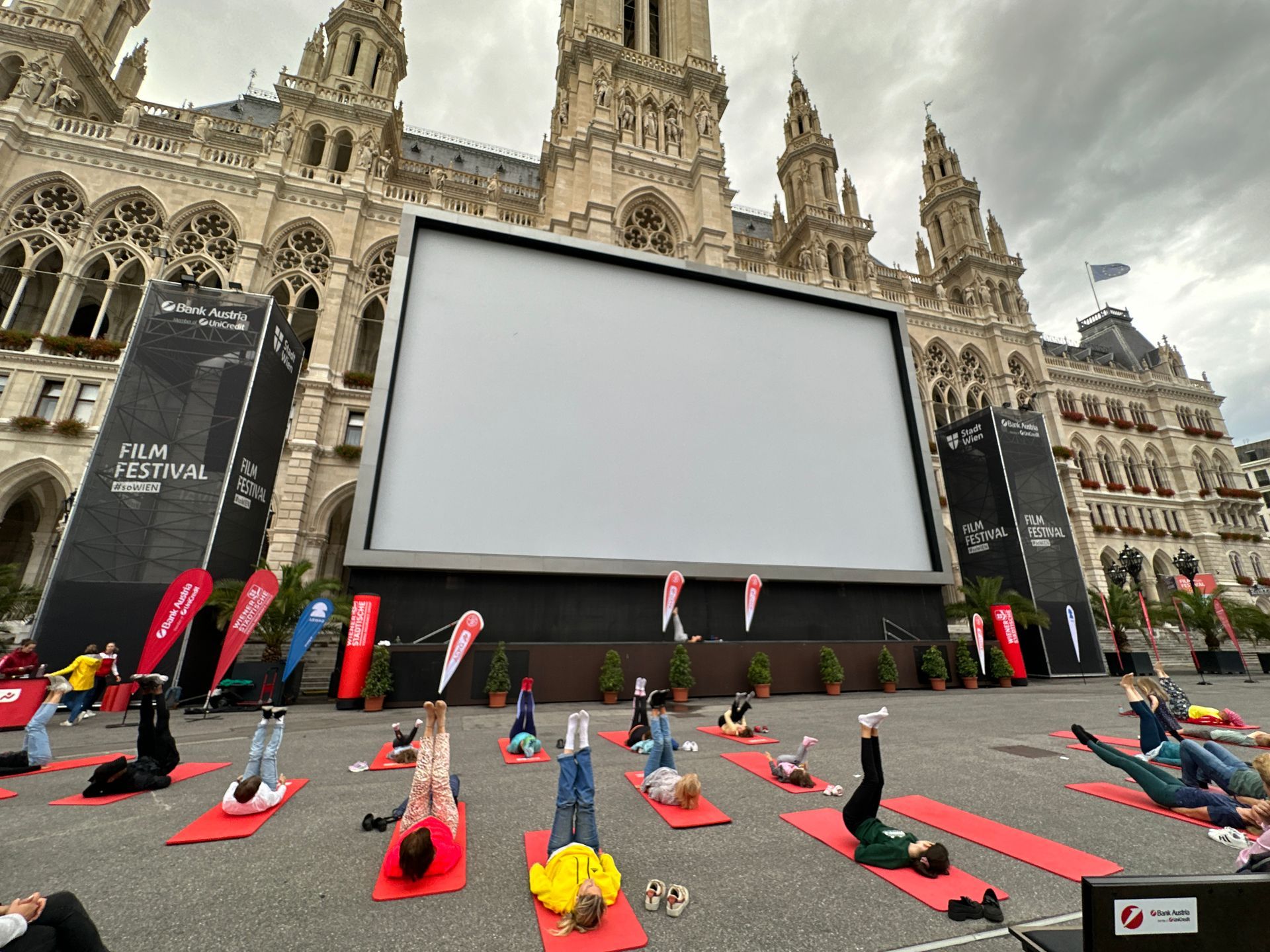 Viparita Karani,  Yoga on the stage of Filmfestival, Rathauspaltz