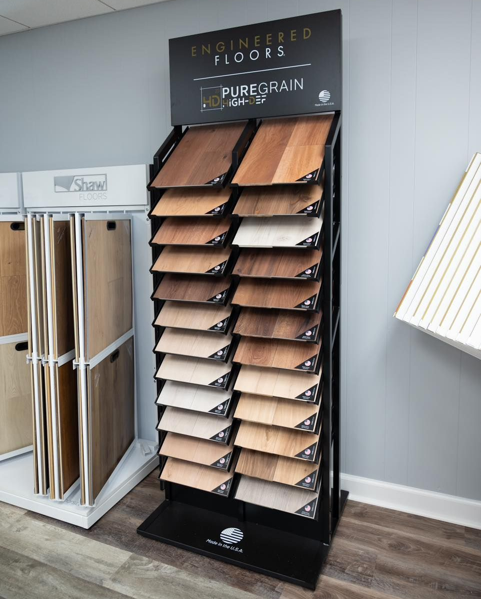 Display stand showcasing various engineered wood flooring samples.