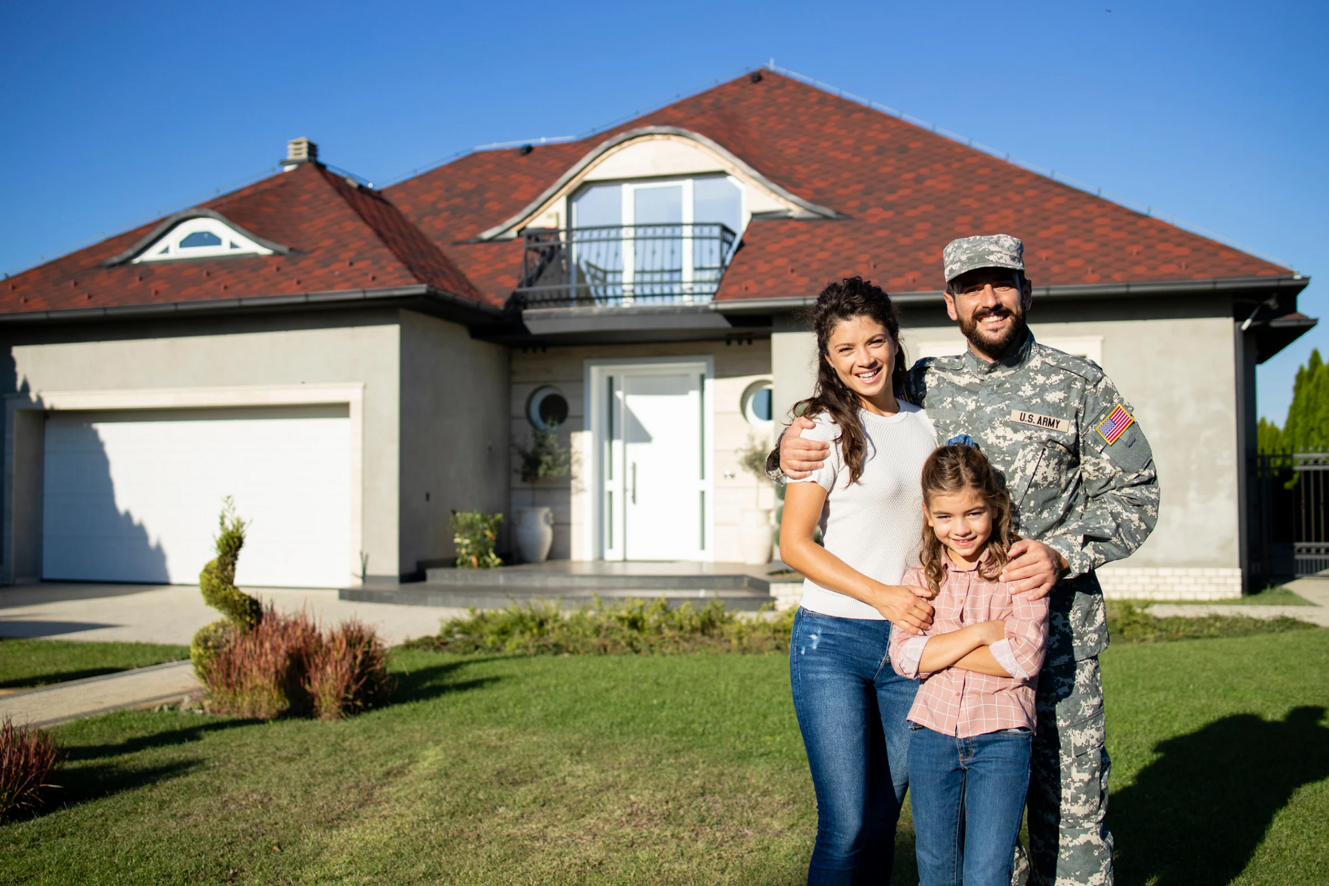 military family moving into a new home