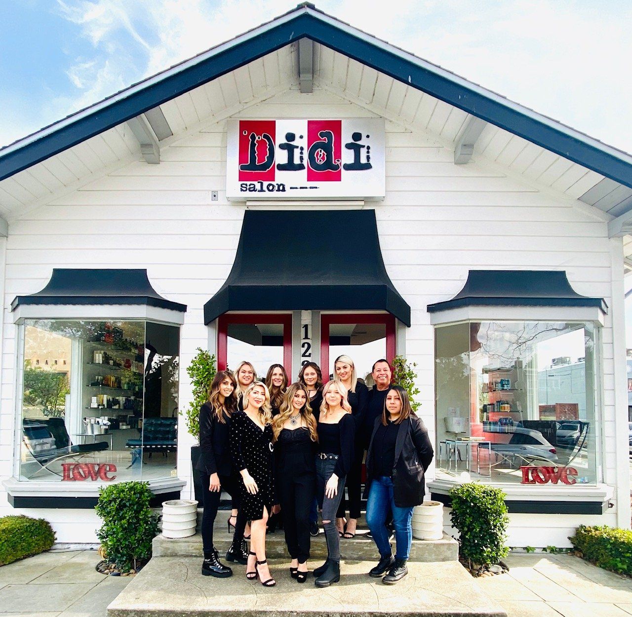 Didi Salon Stylists in front of Salon