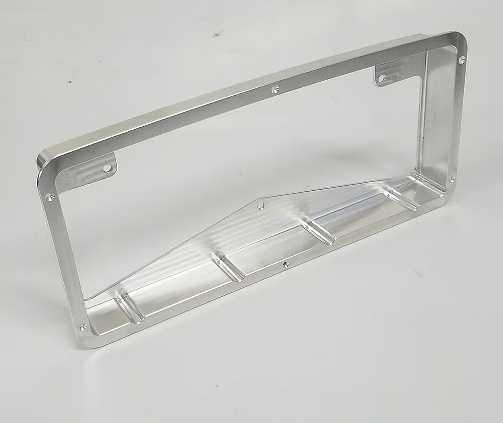A billet dash mount bezel made by Precision Metal Craft for a MoTeC C1212.