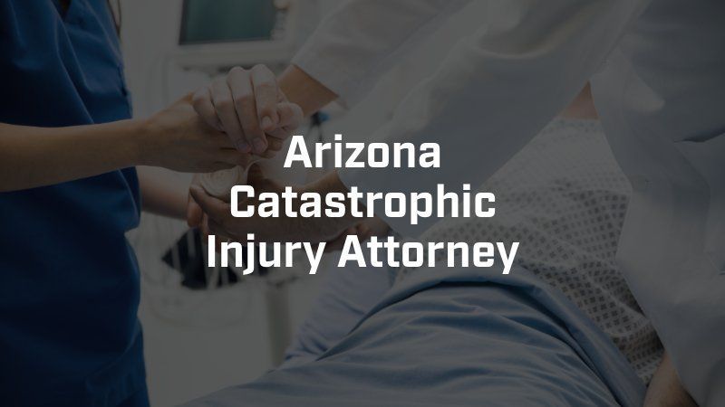 An arizona catastrophic injury attorney is holding a patient 's hand