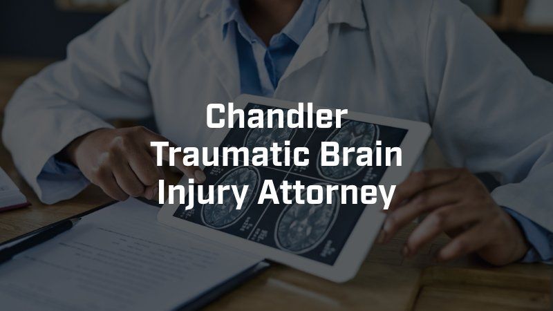 A doctor is holding a tablet with a brain scan on it.