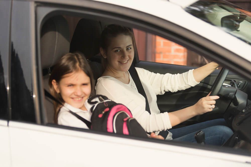 can a 10 year old sit in the front seat of a car