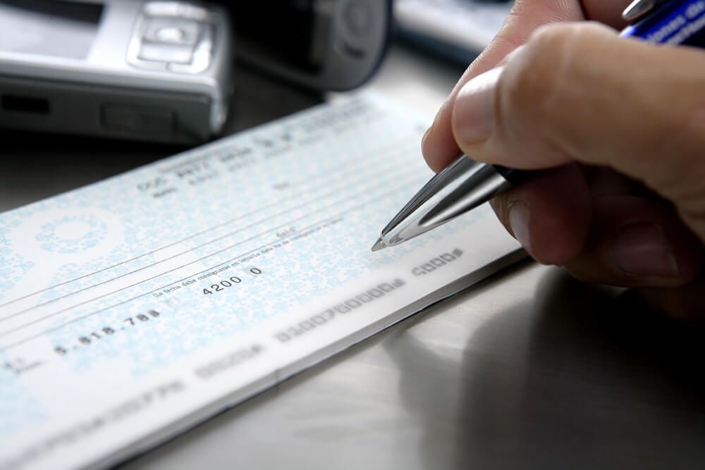 How long after a rear end collision settlement do I get my check?