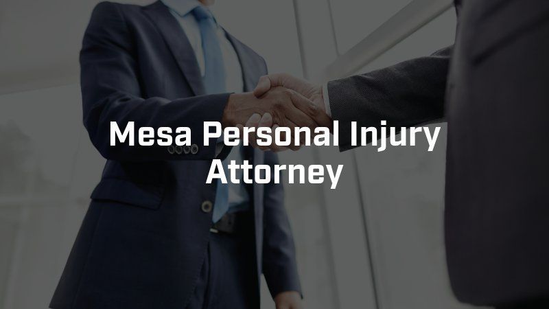 A man in a suit and tie shaking hands with another man.