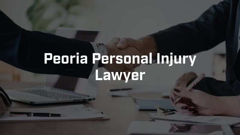 A peoria personal injury lawyer shaking hands with a client