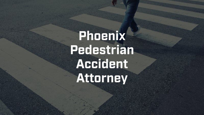 A person crossing a crosswalk with the words phoenix pedestrian accident attorney below them