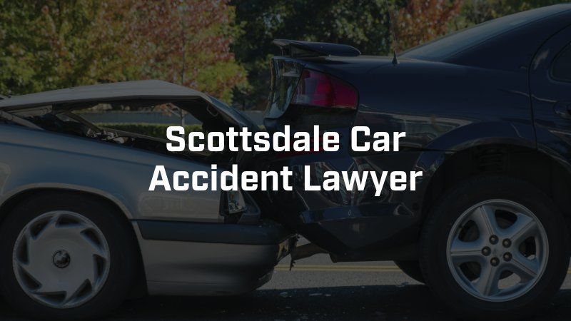A picture of a car accident with the words scottsdale car accident lawyer below it.