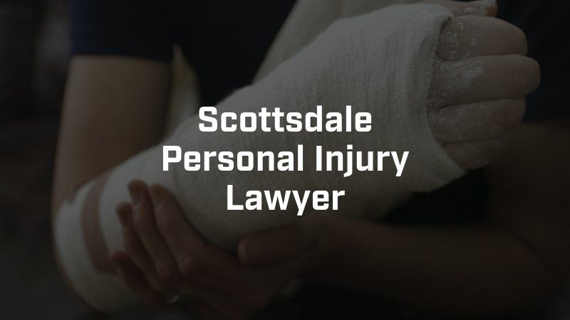 A person with a cast on their arm is being held by scottsdale personal injury lawyer