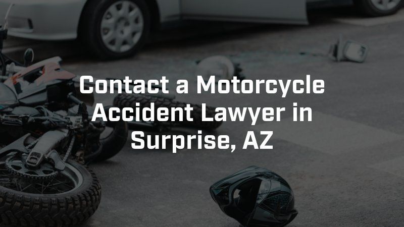 A picture of a motorcycle accident with the words contact a motorcycle accident lawyer in surprise az