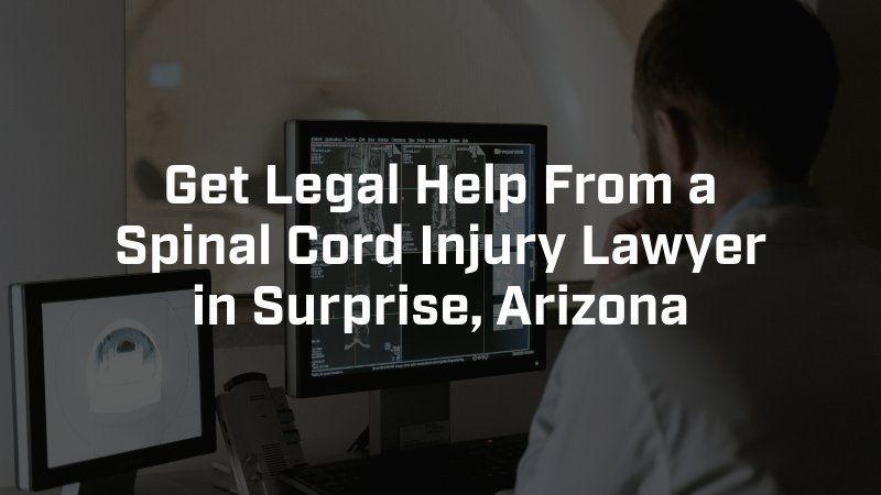 A man sitting in front of a computer with the words get legal help from a spinal cord injury lawyer in surprise arizona