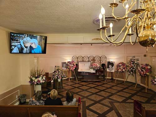 Douglass Family Mortuary several photos of interior views in Lynwood, CA spacious chapel, open and beautiful courtyard with seating