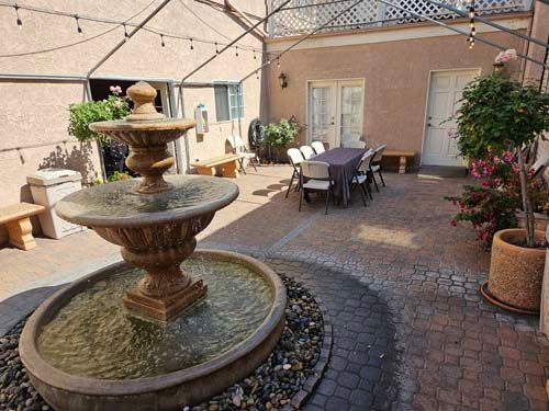 Douglass Family Mortuary several photos of interior views in Lynwood, CA spacious chapel, open and beautiful courtyard with seating