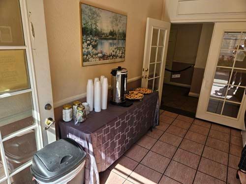 Douglass Family Mortuary interior photos in Lynwood, CA spacious chapel, open and beautiful courtyard with seating