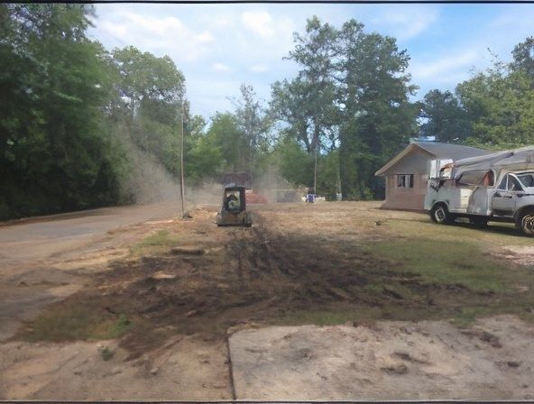 Stump grinding equipment working on cleared land Arkadelphia AR