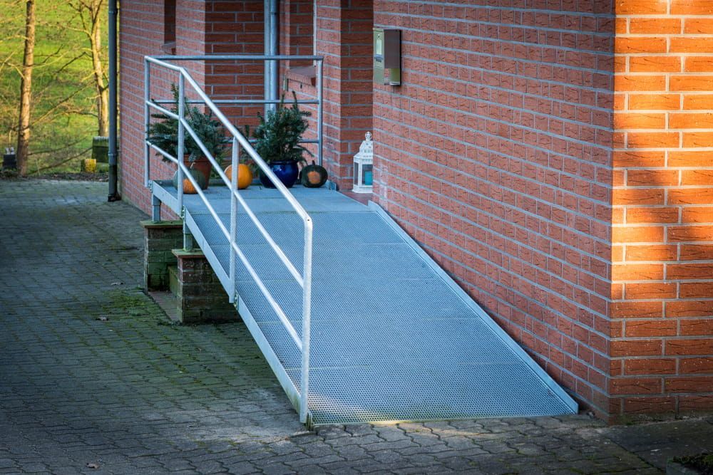 A Brick Building With A Ramp Leading Up To It  — My Coast Projects in West Gosford, NSW