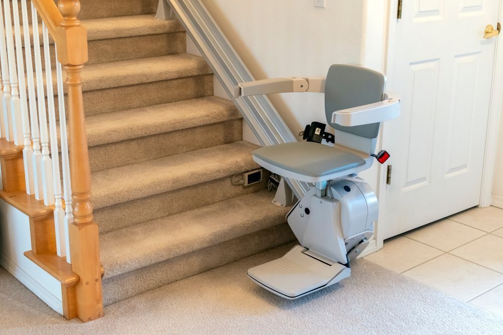 Chair Lift Above Carpeted Stairs - My Coast Projects, NSW