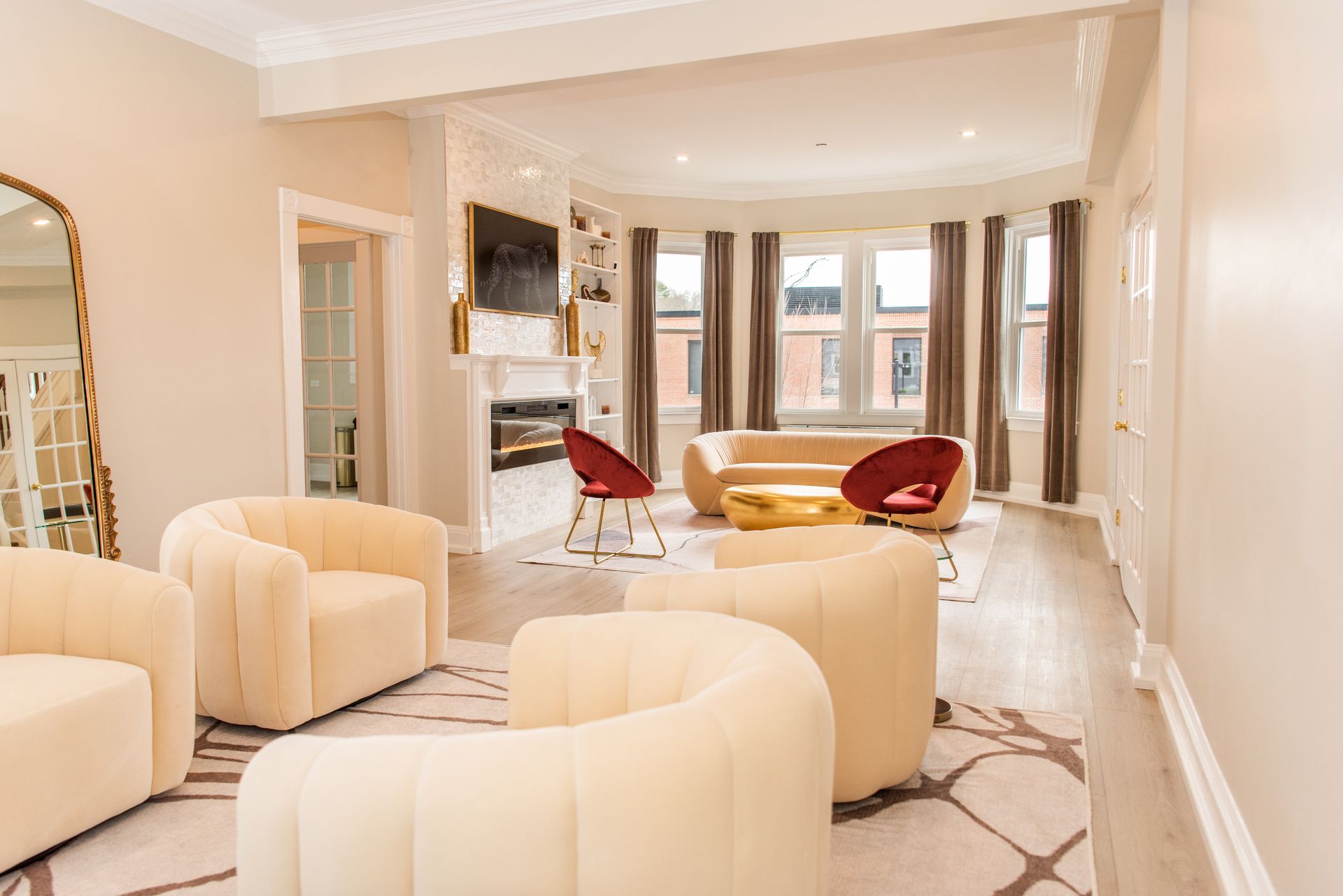 a living room filled with furniture and a fireplace .