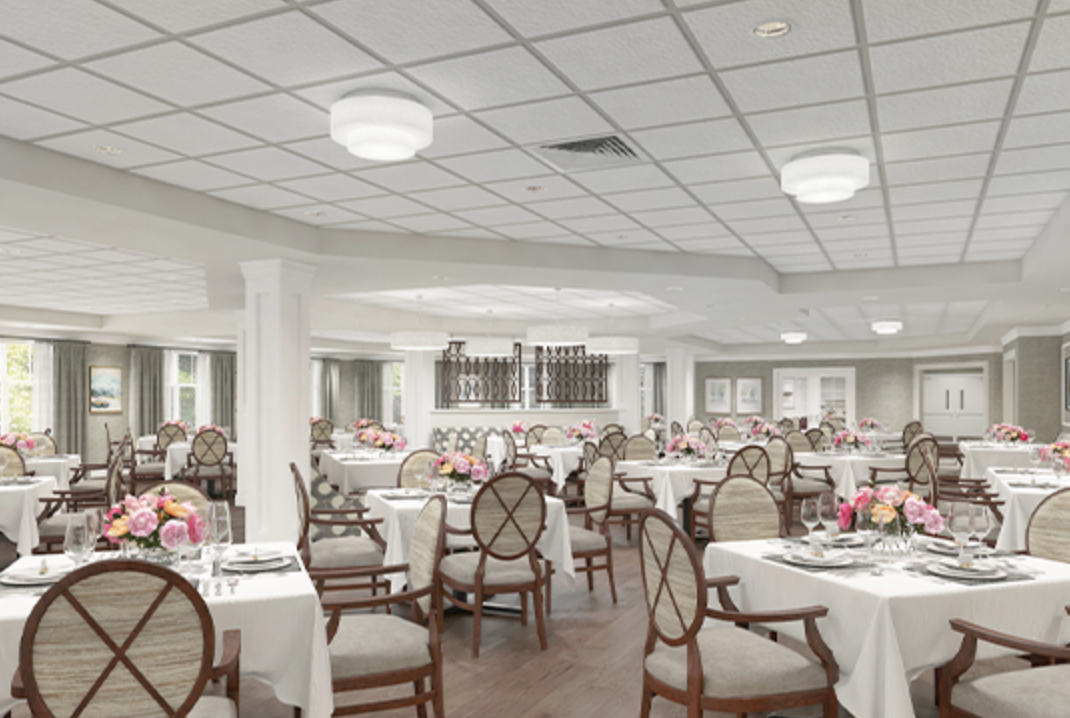 A large dining room filled with tables and chairs.
