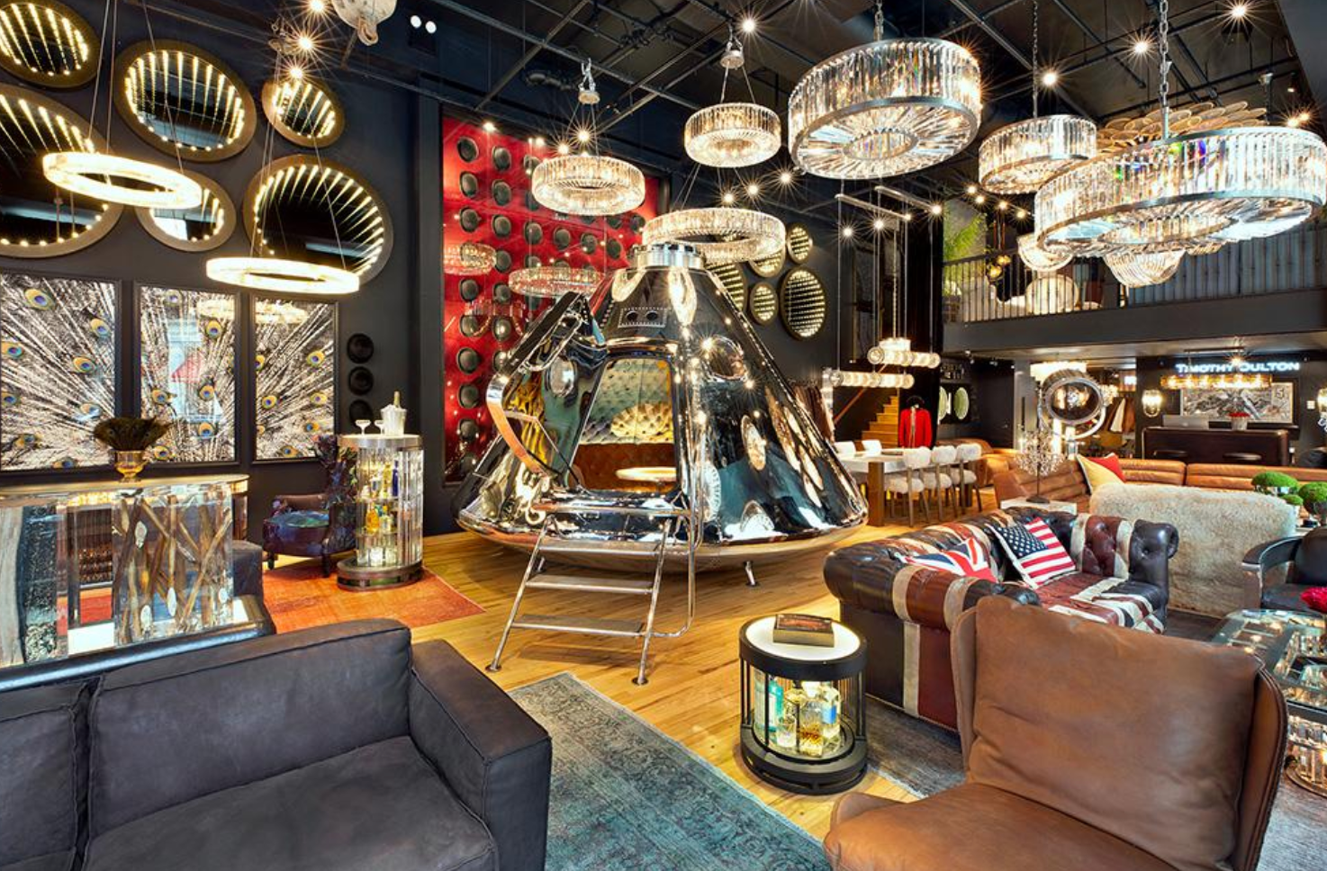 A living room filled with furniture and a staircase.