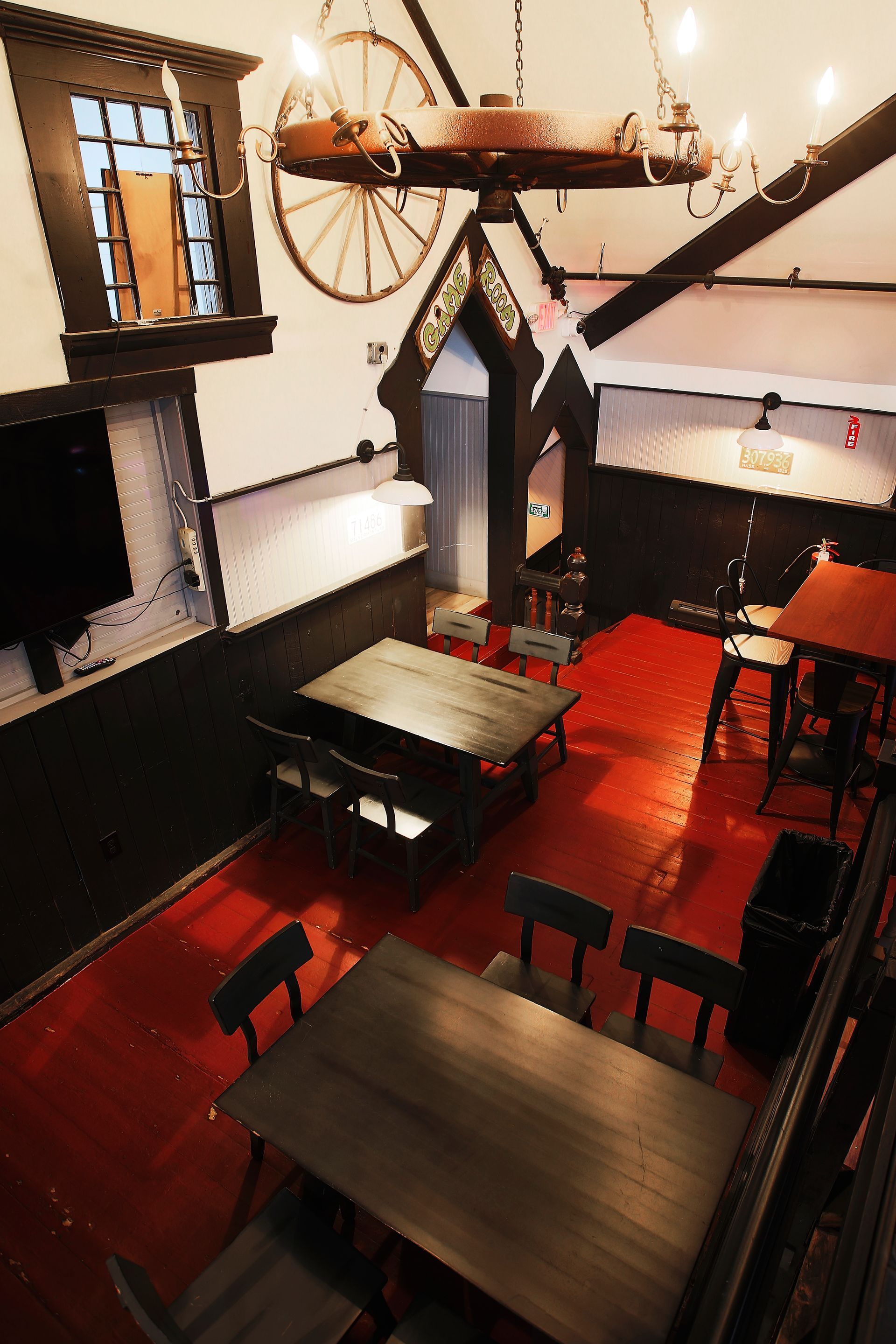 An aerial view of a restaurant with tables and chairs