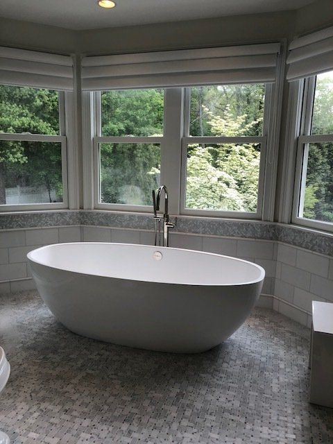Bathtub Near the Window — Acton, MA — Upstairs Downstairs