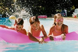 Children playing in the pool — Pool Cleaning and Maintenance in Gettysburg, PA