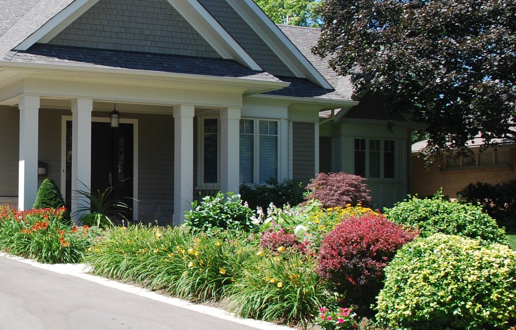 after front garden design with plantings