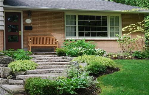 Stone steps lead to sitting area