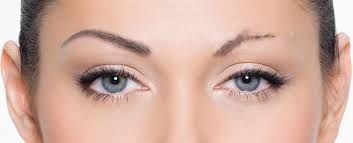 Close-up of a person's face with unevenly shaped eyebrows. One is filled in, the other has sparse hairs.