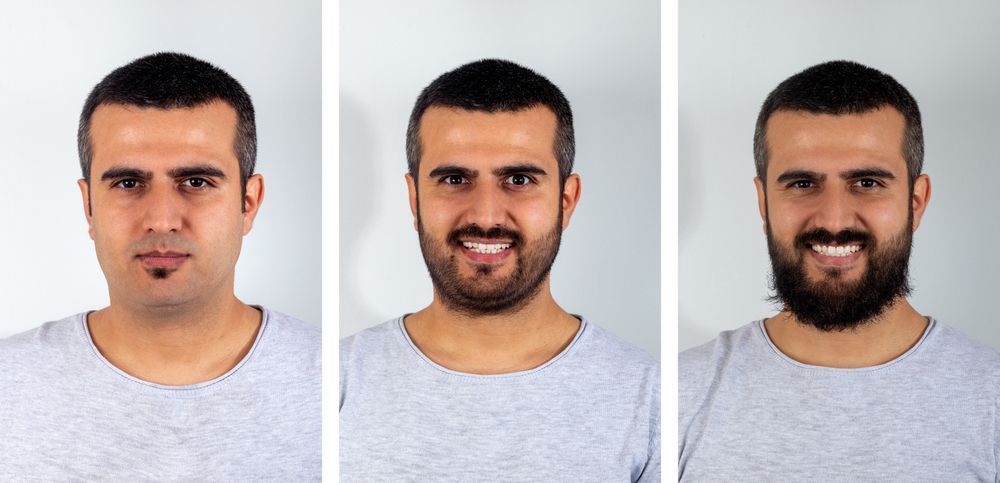 Three portraits of the same man with different beard lengths, ranging from a goatee to a full beard, all smiling.