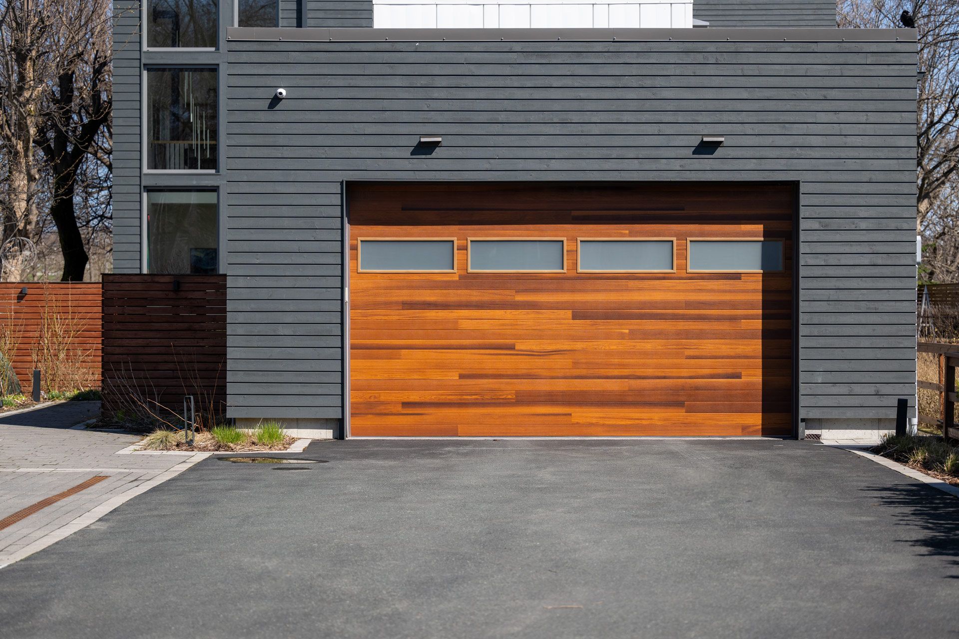 A modern house with a wooden garage door