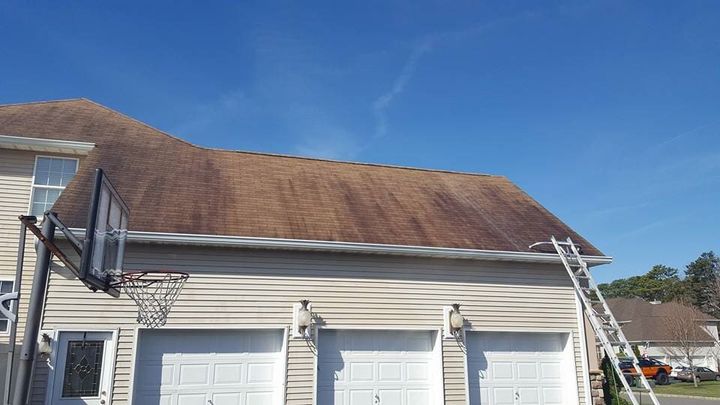 Residential Power Washing Services  — Brown Roof with Before Powerwash in Brick, NJ