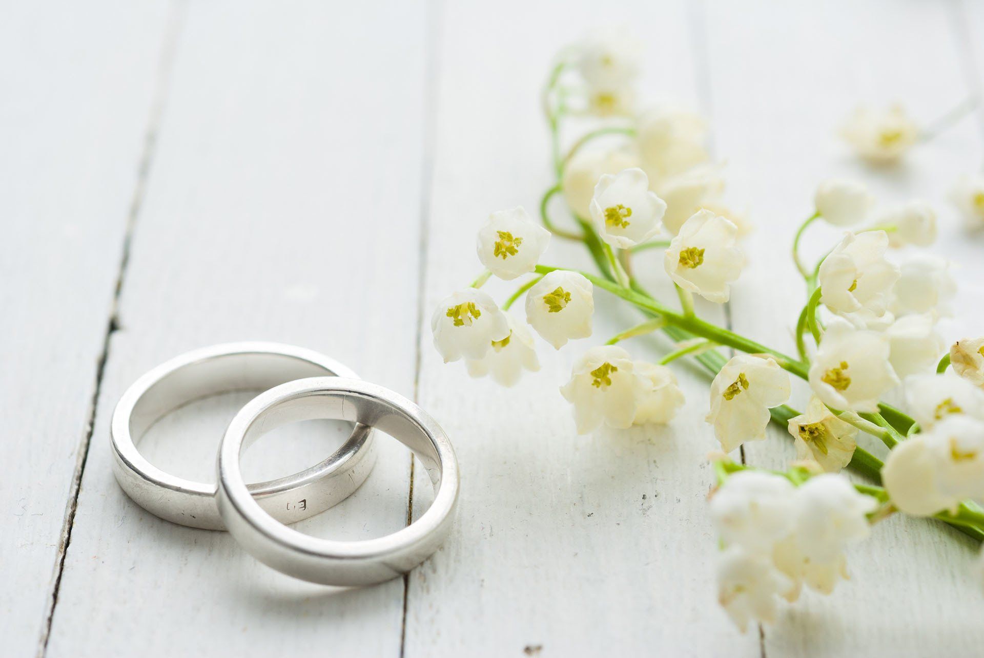 Two Wedding Rings With White Flower — Aston, PA — Dyer's Jewelers