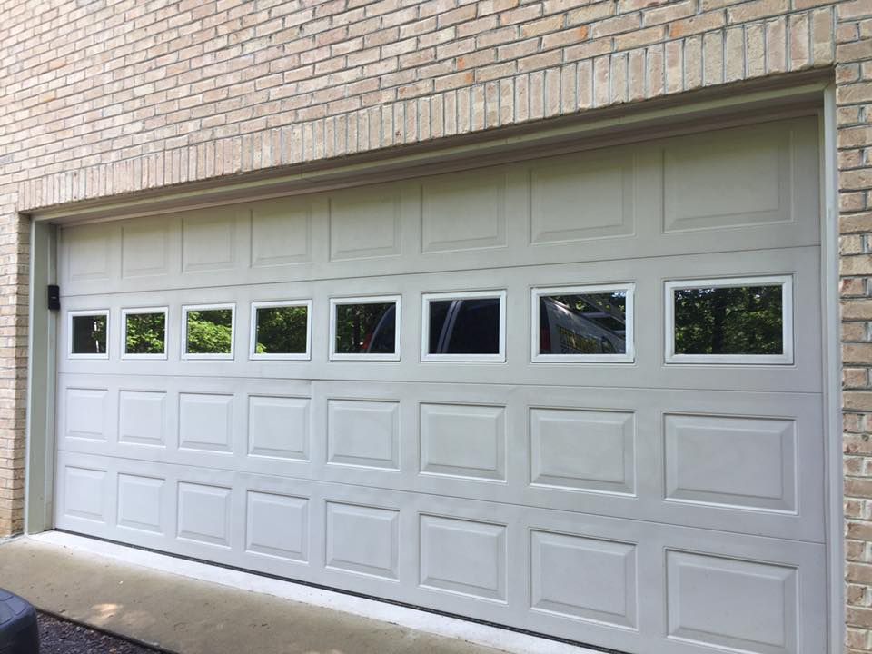Before White Garage Door is Open on a Brick — Culpeper, VA — Quality Garage Doors VA