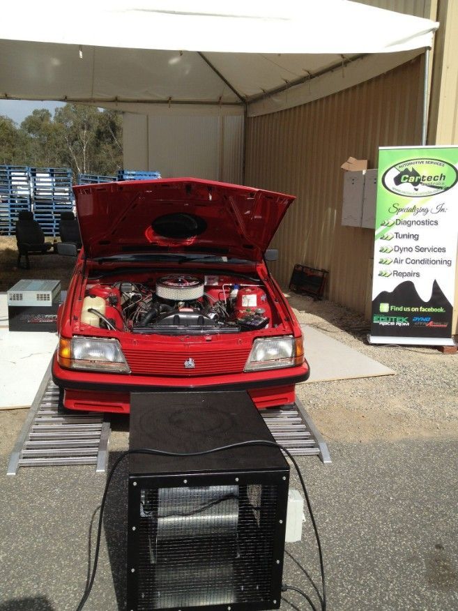 Red Car Under Repair — Cartech Australia in Albury, NSW
