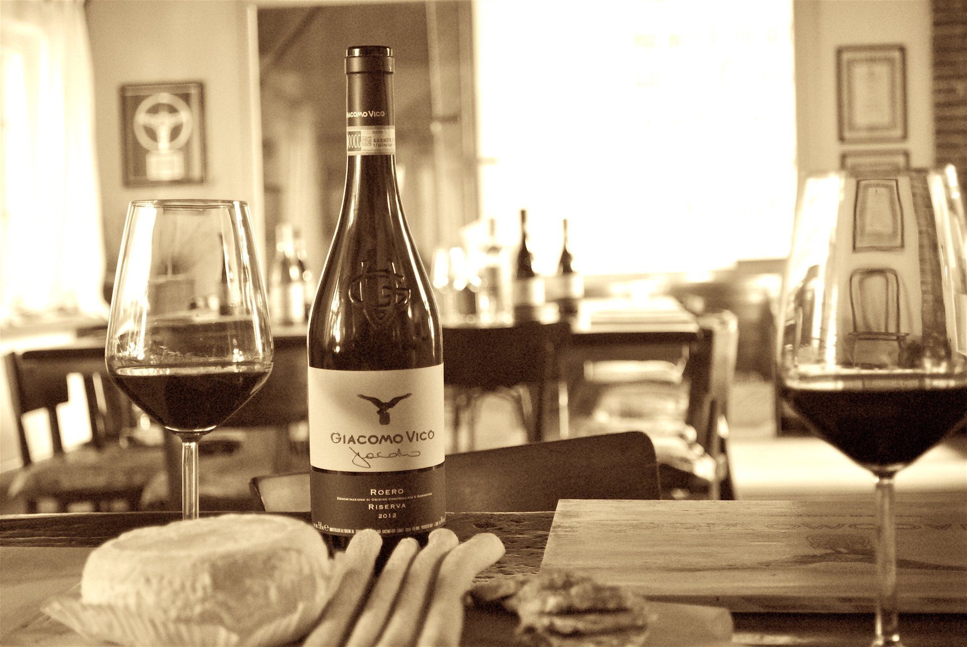 bottle and glasses of red wine