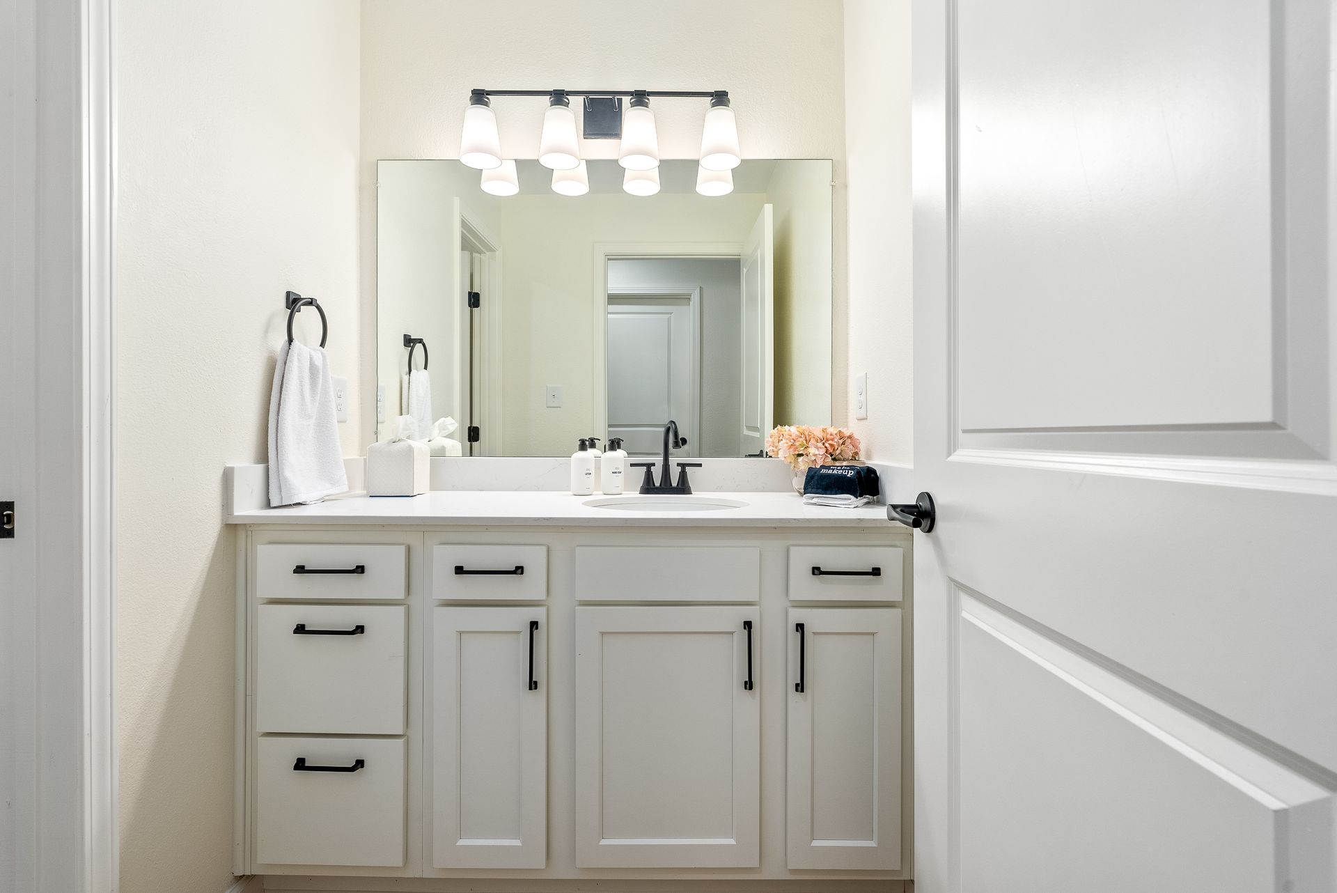A professionally cleaned bathroom featuring sparkling fixtures, completed by Polished Oak Cleaners during a routine service on E Glenn Ave in Auburn
