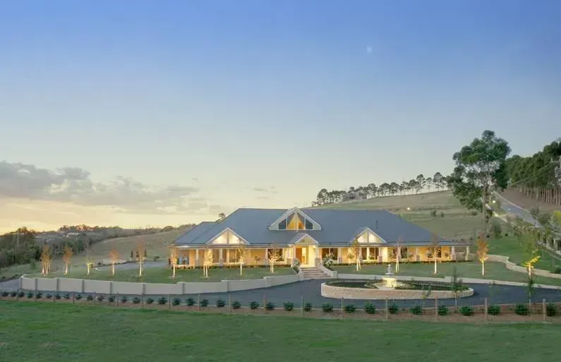 A Large House Sits in the Middle of a Lush Green Field | Warragul, VIC | ADI Building Services