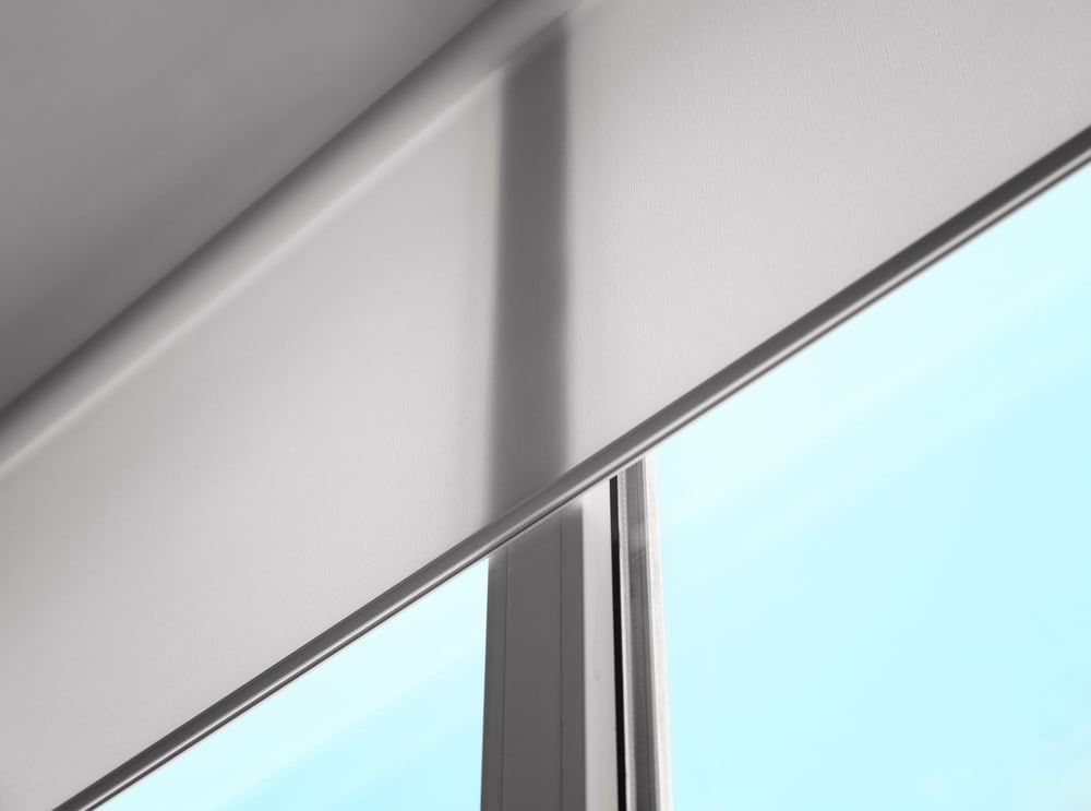 A Close up Of a Roller Blind on A Window — Phoenix Blinds In Albion Park Rail, NSW