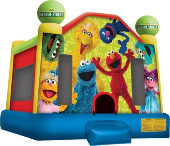 A bouncy house with sesame street characters on it