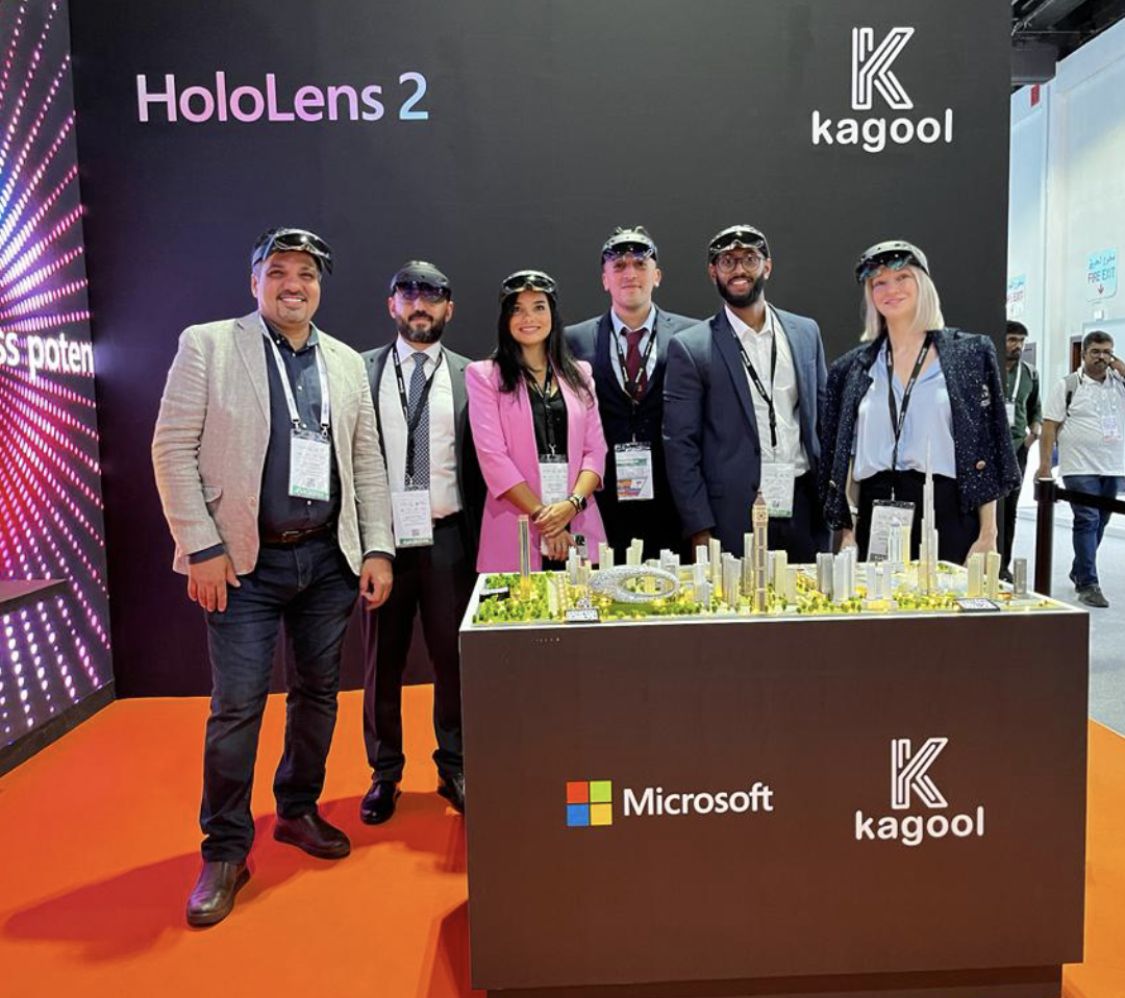 Kagool and Microsoft team members together with HoloLenses, at exhibition stand