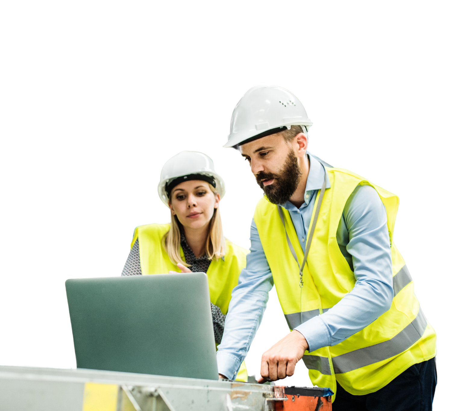 A man and a woman are looking at a laptop computer.