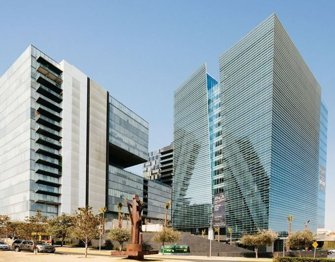 A large building with a statue in front of it