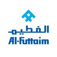 A blue logo with arabic writing on a white background.