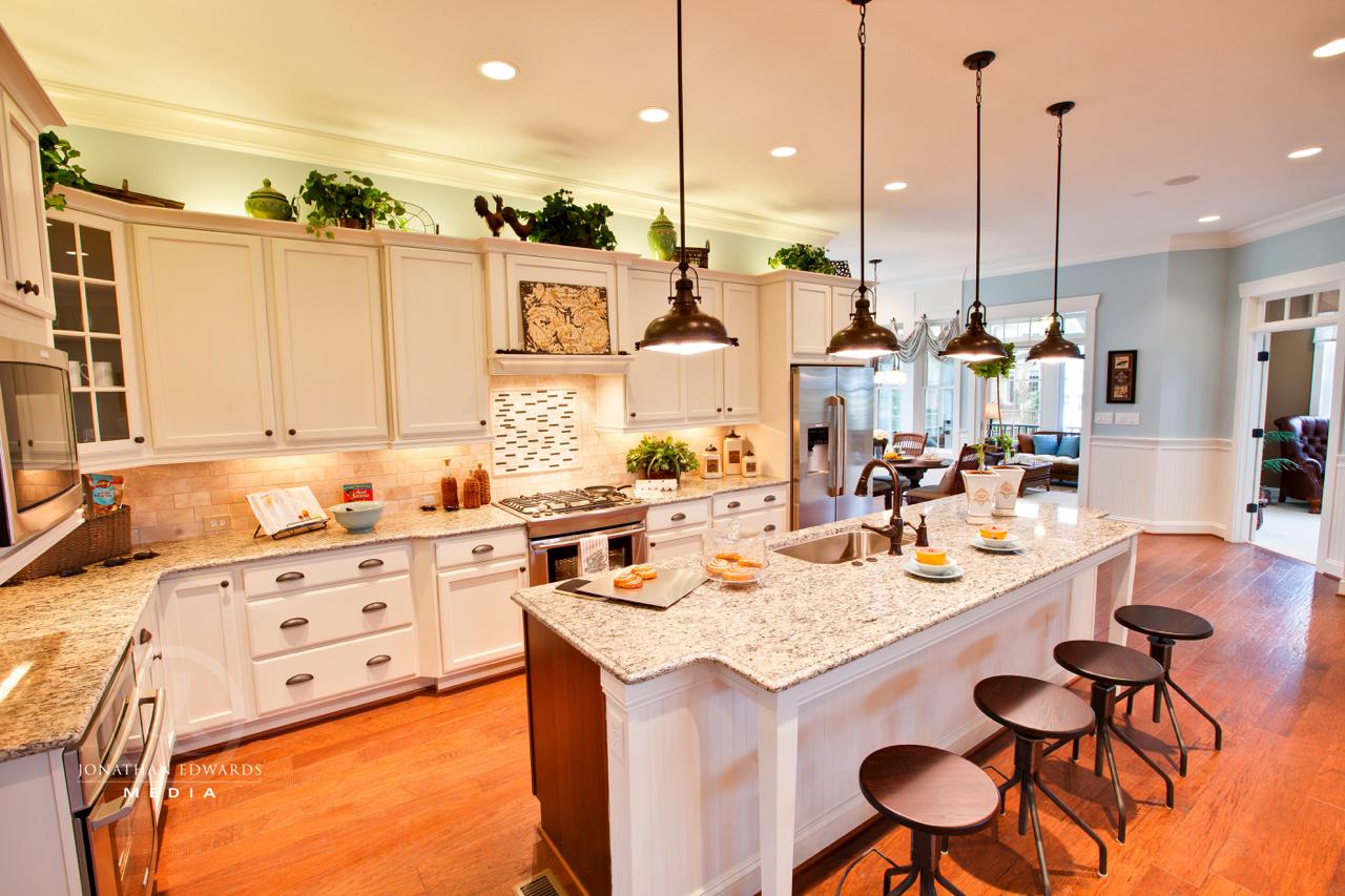 Elegant kitchen white island with stools | Kitchen Gallery | Stephen Alexander Homes | Chesapeake, VA