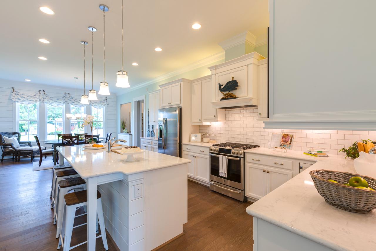 Elegant kitchen white island with stools | Kitchen Gallery | Stephen Alexander Homes | Chesapeake, VA
