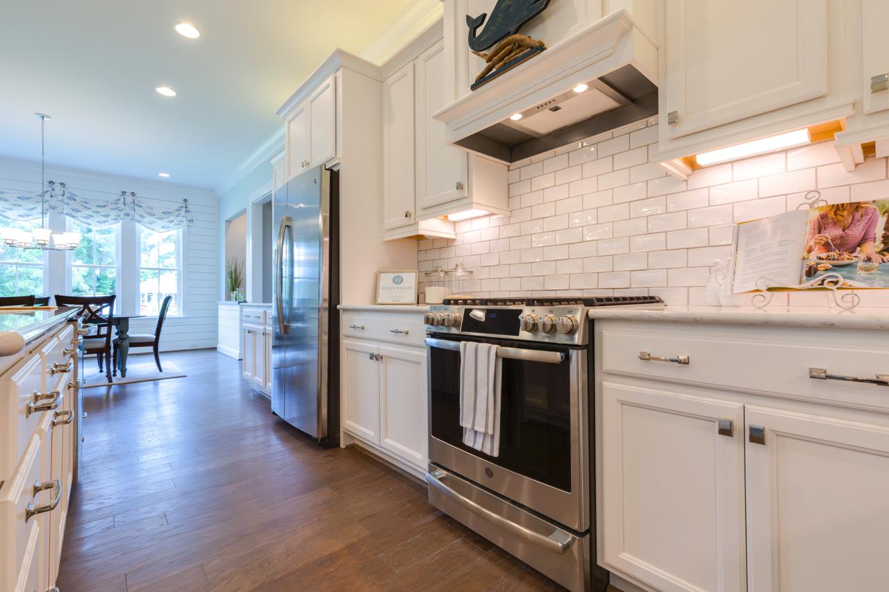 Elegant kitchen stove and white cabinets | Kitchen Gallery | Stephen Alexander Homes | Chesapeake, VA